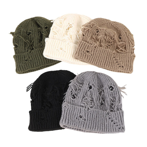 Gorro de punto acrílico desgastado con agujeros, logotipo personalizado, cálido para invierno, gorro tipo calavera acanalado, venta al por mayor de fábrica común, sombrero OEM ODM - Product Image 6