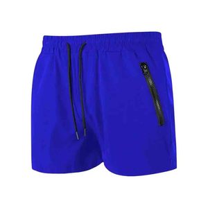 Shorts de sport pour homme, bleu uni, séchage rapide, taille élastique, cordon de serrage, poche zippée, décontractés, pour la course à pied - Product Image 3