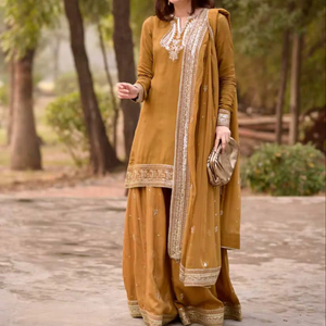 Nouvel ensemble de soirée de créateur : Sharara, Plazzo et Dupatta - Kurta Peplum en soie brodée couleur moutarde avec ensemble Sharara - Product Image 1