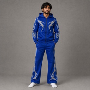 Ensemble de survêtement unisexe épais 2-en-1 bleu roi avec veste à capuche zippée et pantalon large à imprimé abstrait gris - Product Image 1