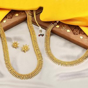 Conjunto de collar largo y gargantilla con diseño de flor chapado en oro clásico y aretes para mujer, joyería de diseñador para bodas y festividades. - Product Image 1
