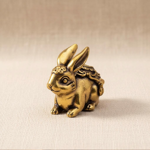 Detailed ornate brass <b>rabbit</b> sculpture with intricate patterns. Lucky Vastu charm for harmony. Available at wholesale price. - Product Image 1