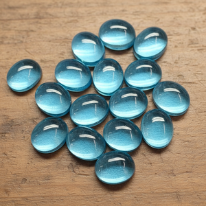 Cabujones de Vidrio Color Topacio Azul al por Mayor 7x9 MM para Joyería y Decoración, Piedra de Vidrio Topacio Azul para Anillos, Exportador Global - Product Image 1