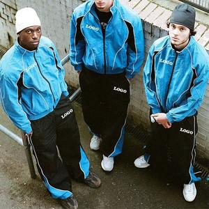 ผู้ผลิตเสื้อผ้าตามสั่ง ชุดแจ็คเก็ตกันลม ชุดวอร์มไนลอนน้ำหนักเบา ชุดวอร์มสีตัดต่อ ชุดจ็อกกิ้ง - Product Image 1