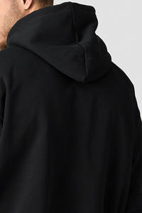 Sweat à capuche noir uni de haute qualité, imprimé avec logo personnalisé, en molleton 430 g/m², écologique, coupe ample, épaules tombantes, fabriqué par un fabricant - Product Image 6