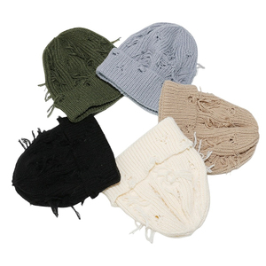 Gorro de punto acrílico desgastado con agujeros, logotipo personalizado, cálido para invierno, gorro tipo calavera acanalado, venta al por mayor de fábrica común, sombrero OEM ODM - Product Image 4