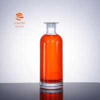 Bouteille en verre cylindrique à épaule arrondie et à large ouverture de 750 ml, idéale pour l'emballage du brandy, du vin de fruits et du whisky