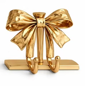 Casting Aluminium Bow <b>Tie</b> Shape New Stocking Holder For Fire Place Home Decoration Use Metal Stocking Holder Hook - Product Image 1