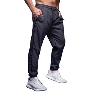 Pantalon de sport ajusté en polyester à maille performance œil-de-perdrix, coupe ajustée, avec fermeture à revers, pour la performance athlétique, Vente B2B - Product Image 6