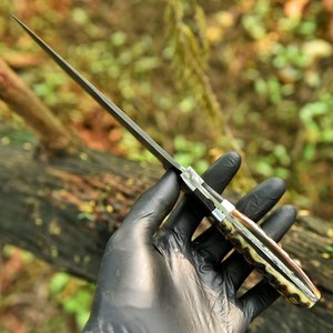 Cuchillo Bowie de Caza de Hoja Fija de Acero de Damasco de Grado Industrial de Alta Calidad UA Supplies con Punta Caída y Mango de Cuerno de Carnero OEM/ODM - Product Image 5