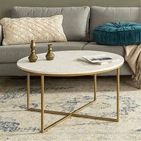 Petite table basse ronde en marbre blanc naturel avec des veines grises et une base en acier géométrique en croix