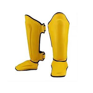 Protège-tibias jaunes en néoprène avec fermeture auto-agrippante pour la boxe, équipement de protection unisexe adulte, ajustement élastique réglable - Product Image 1
