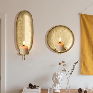 Ensemble de deux appliques murales en métal doré texturé avec des plaques arrière rondes et ovales pour une décoration murale élégante de la maison - Product Image 3