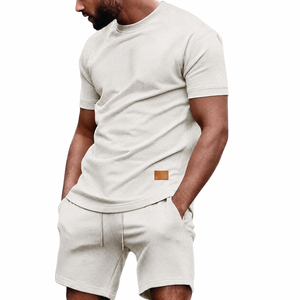 Conjunto de Camiseta y Pantalones Cortos para Hombre con Logotipo Personalizado, Color Beige Texturizado, Manga Corta, Traje Deportivo de Verano, Venta al Por Mayor, Fabricante de Ropa Deportiva Casual OEM - Product Image 1