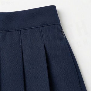 Jupe plissée courte pour femme, couleur unie bleu marine, taille normale, style confortable pour toutes les saisons - Product Image 5