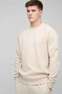 เสื้อสเวตเชิ้ตคอกลมสีครีมสำหรับผู้ชาย แขนเสื้อแบบแร็กแลน ทรงปกติ สีพื้นเรียบง่าย สวมใส่สบายในฤดูใบไม้ร่วง ผ้าถักเฟรนช์เทอร์รี่ - Product Image 1