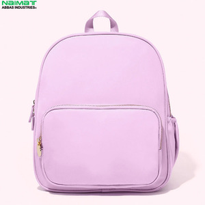 Mochila de nailon impermeable de gran capacidad en color caramelo para niños, mochilas escolares a la moda con cierre de cremallera. - Product Image 4