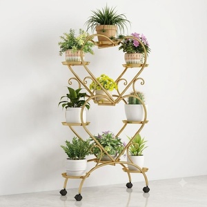 Support à fleurs vintage en fer forgé recouvert d'époxy artisanal Khang Hung Phat, 3 pots, élégant, motif circulaire, pour intérieur - Product Image 1