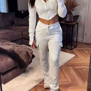 Women's <b>Light</b> Gray Solid Color Cotton Tracksuit Casual Wear Breathable Full Sleeve Hooded Zipper Front With Side Pockets - Product Image 1