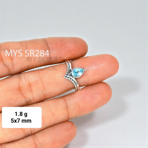 แหวนเงินแท้ 925 ประดับบลูโทแพซเหลี่ยมเจียระไน น้ำหนักเบา ทำด้วยมือ - Product Image 1