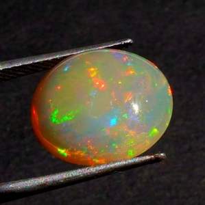 Opale d'Éthiopie Jaune Naturel, Coupe Ovale, Cabochon Certifié IGI, Effet de Couleur - Product Image 4