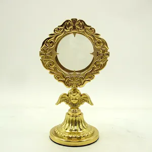 New Brass Reliquary With Golden Finishing Round Shape Embossed Crosses Design With Angel Face Genuine Quality For Display