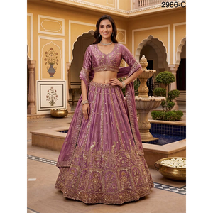 Colección de Ropa de Novia de Diseño Moderno y Calidad de Lujo, Lehenga Choli de Seda con Patrón de Pavo Real, Bordado y Adornos Zari - Product Image 1