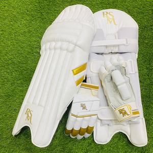 Suministros de grillo RSM, protector de piernas dorado y blanco - Product Image 1