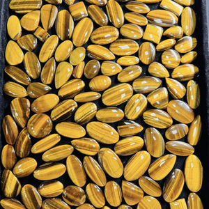 พลอยตาเสือธรรมชาติทรงกลม-วงรี ขัดเรียบ รูปทรงโค้งมน  หินกึ่งมีค่า - Product Image 1