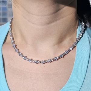 Collar de Cadena de Tenis Chapado en Oro con Diseño de Estrella de Lujo, Unisex, con Piedras Redondas Incrustadas y un Brillo Elegante, Joyería de Moda - Product Image 1