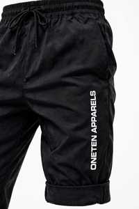 ONETEN APPARELS กางเกงวอร์มสีดำสำหรับผู้ชาย เอวยางยืด มีเชือกผูก แห้งเร็ว น้ำหนักเบา กางเกงจ็อกเกอร์ลำลองพร้อมพิมพ์โลโก้ด้านข้าง - Product Image 6