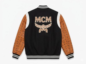 เสื้อแจ็คเก็ตบอมเบอร์ MCM Monogram Varsity สีดำ แขนหนังสีคอนยัค ดีไซน์หรูหรา - Product Image 1
