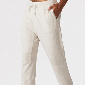 Pantalon de survêtement en coton beige pour homme, taille élastique avec cordon de serrage, poches latérales, décontracté, mi-saison, tricoté - Product Image 1