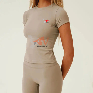 เสื้อยืดออกกำลังกายคอกลมผ้าไนลอนแบบสลิมฟิตสำหรับผู้หญิง คุณภาพสูง ผลิตตามสั่ง (OEM) ขายส่งเสื้อผ้าออกกำลังกายแบบเรียบๆ ไม่มีลาย - Product Image 1