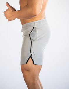 Shorts de sport pour hommes en polyester et élasthanne, bleu marine uni, taille mi-haute, élastique, séchage rapide, avec bande latérale tricotée - Product Image 6