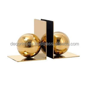 These particular <b>bookends</b> feature a modern and elegant design characterized by a gold colored sphere integrated into a geometric - Product Image 5