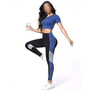 Conjunto de yoga y fitness que absorbe el sudor, de secado rápido, anti-pilling, pantalones de cintura alta que realzan los glúteos, camiseta transpirable de algodón y leggings. - Product Image 1