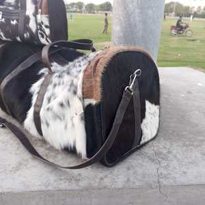 กระเป๋าเดินทางหนังแท้คุณภาพพรีเมียม หนังวัว  แบบถือหรือสะพาย  สำหรับเดินทางช่วงสุดสัปดาห์  รับผลิตตามแบบ (OEM) สำหรับส่งออกจำนวนมาก รุ่น LHTB-0105 - Product Image 5