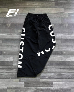 Pantalones deportivos casuales de nailon de peso medio personalizados, de pierna ancha, holgados, de secado rápido, transpirables, con estampado por transferencia térmica, para hombre, al por mayor - Product Image 2