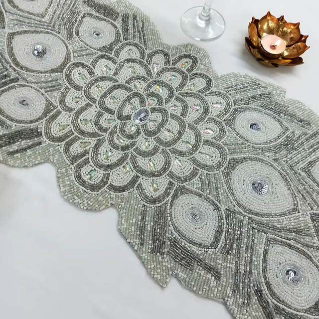 Handmade silver peacock feather design beaded table runner