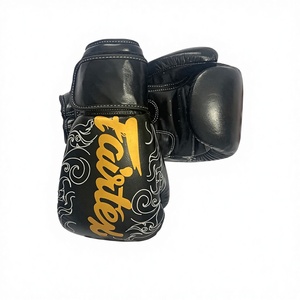 นวมชกมวย Fairtex รุ่นใหม่ล่าสุด - หนังแท้สำหรับฝึกซ้อมและต่อยมวย - อุปกรณ์มวยไทยสีดำ ขนาด 10 ออนซ์ ถึง 18 ออนซ์ - Product Image 3