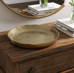 Plateau de service rond doré élégant avec surface texturée et design contemporain, idéal pour des réceptions élégantes et la décoration intérieure - Product Image 1