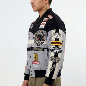 เสื้อแจ็คเก็ตแข่งรถดีไซน์เองสำหรับผู้ชายและผู้หญิง แต่งลายปักสไตล์นักบิด แนวสตรีทแวร์ NASCAR สีดำเทา - Product Image 1