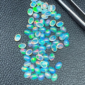 N.N. Opales d'Éthiopie naturelles blanches 4x5mm, cabochons ovales lisses, opales à jeu de couleurs/effet feu, pierres précieuses en vrac en gros à vendre - Product Image 4