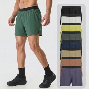 Shorts de course à séchage rapide pour hommes, couleur unie, taille élastique, shorts de sport pour la gym, en polyester tricoté, longueur courte, taille mi-haute - Product Image 2