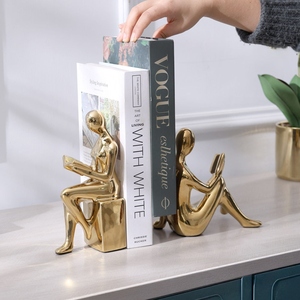 Modern design abstract cast aluminum human figurine bookend set gold finish metal <b>decorative</b> <b>book</b> holder reading man sculpture - Product Image 2