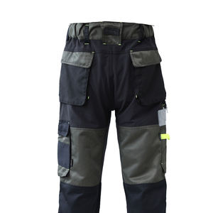 Heavy duty workwear pants for men with reinforced <b>knees</b> and utility pockets for construction and industrial use - Product Image 3