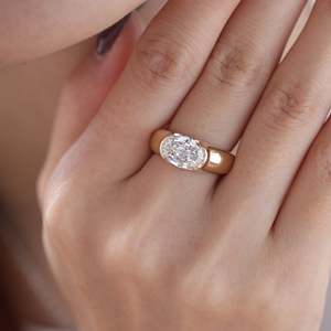 2.5ct Oval <b>Step</b> Cut Lab Grown Diamond Ring 14K Yellow Gold <b>Half</b> Bezel Set Engagement Ring Tapered Wide Band Lab Created Diamond - Product Image 1