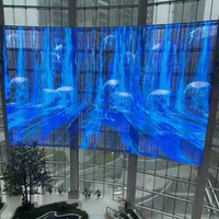 Écran LED extérieur couleur pleine P25, grille transparente, écran LED pour fenêtre en verre extérieur, pour mur vidéo publicitaire LED