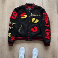 Veste universitaire noire pour homme avec broderie chenille et manches en cuir pour le baseball, vente en gros